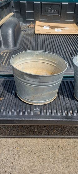 Three very nice galvanized buckets. Two of them are vintage