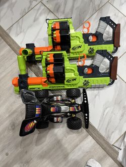toy car and nerf gun