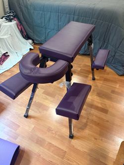Purple portable bench with headrest