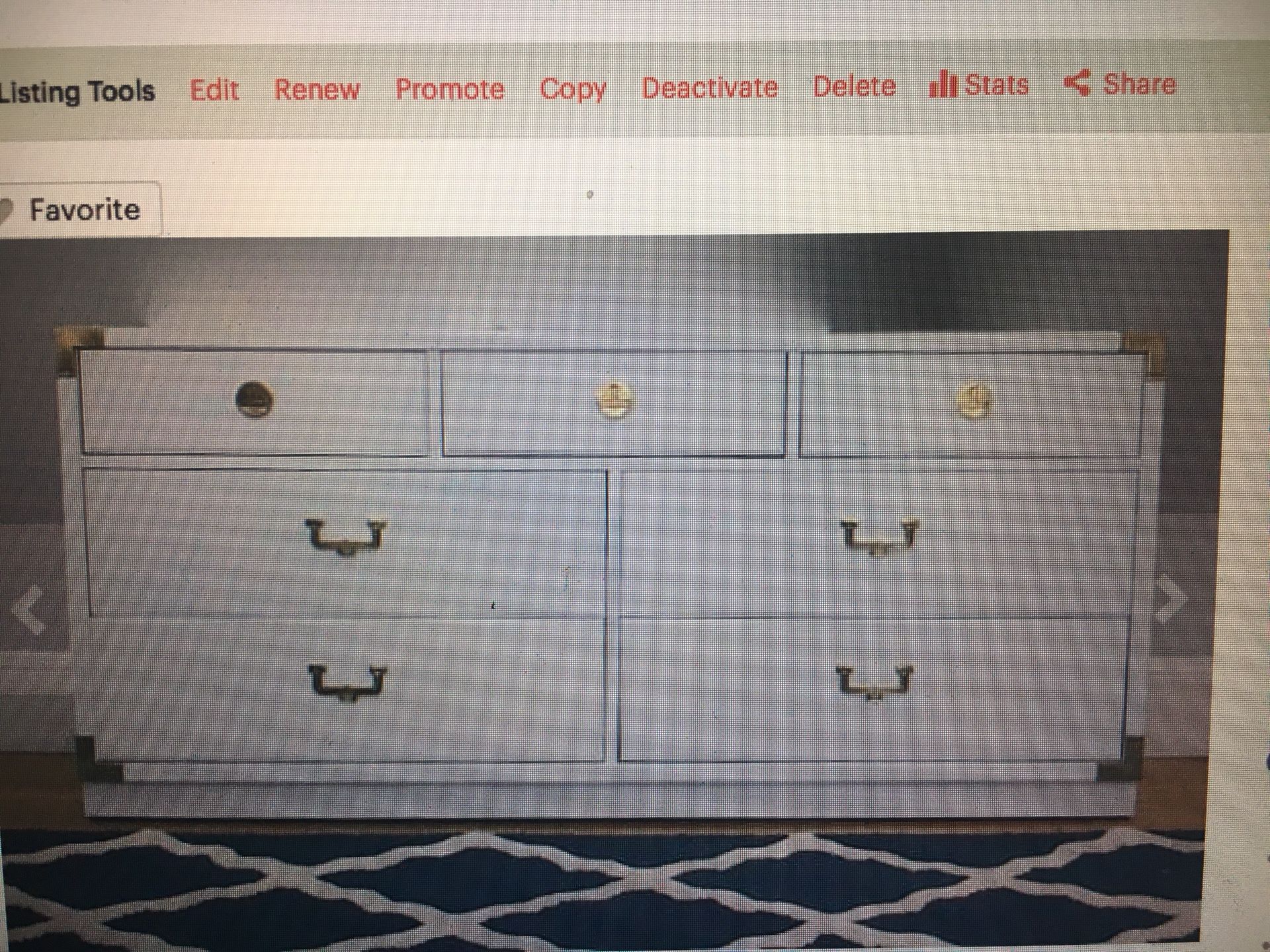 White dresser with brass hardware