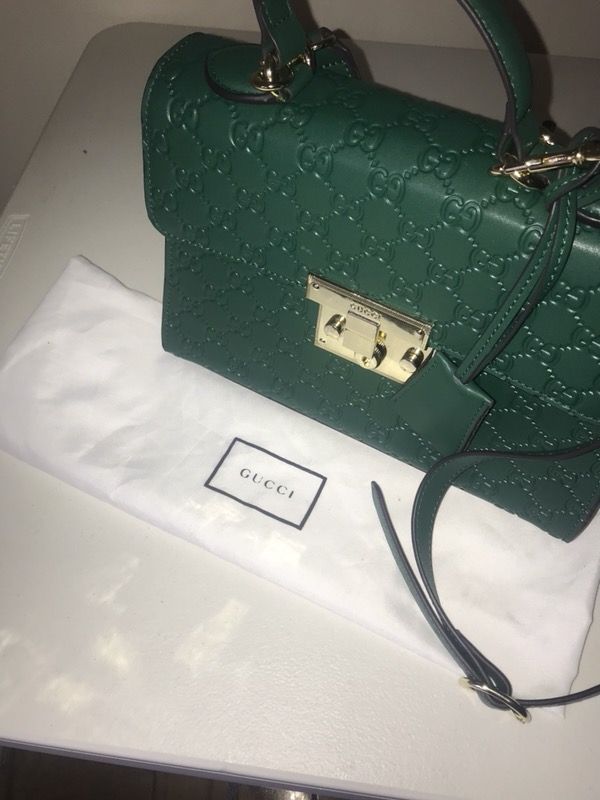 Authentic signature GUCCI padlock shoulder bag. In LIMITED green color