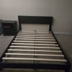 Black Queen Size Bed Frame with headboard.