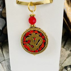 Om Pendant With Faceted Red Onyx