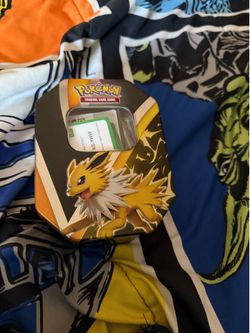 Pokémon tin and accessories