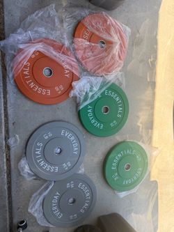 Brand new Olympic bumper weight plates