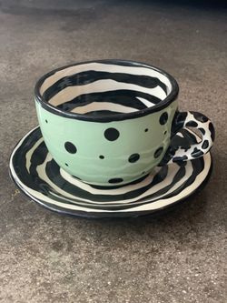 Coffee Cup & Saucer - Kay Bynum & Richard Frideaux