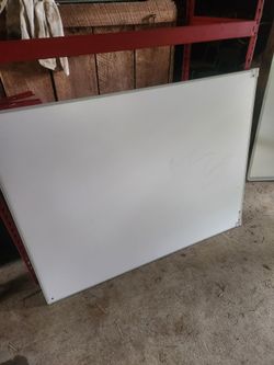 Two dry erase boards and a cory board