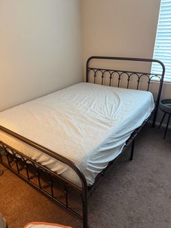 Full-size Purple mattress with matching bed frame