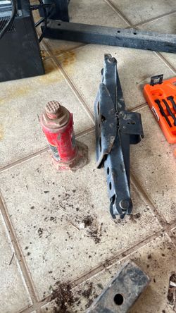 small hydraulic bottle jack and a car scissor jack.