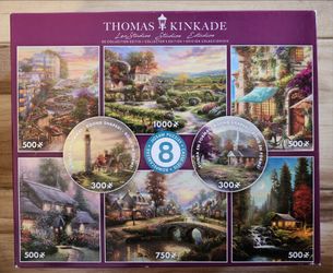 8 pack of Thomas Kinkade jigsaw puzzles