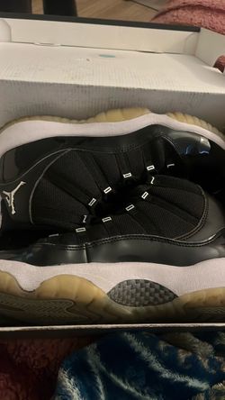 Air Jordan 11 Black Patent Leather Sneakers