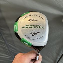 This is a Nextt Green Monster 520cc golf club driver.  