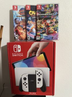 NINTENDO SWITCH OLED WITH GAMES