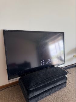 65 inch Sharp Tv with Roku device