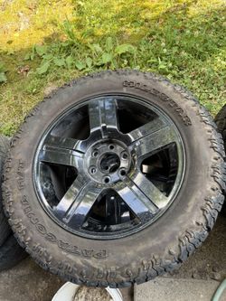 OEM Gloss Black 20" Chevrolet Silverado/Suburban Texas Edition Wheels + Tires