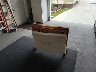 Infant collapsible wooden crib
