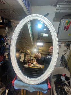 White Framed  22”x32” Oval Mirror