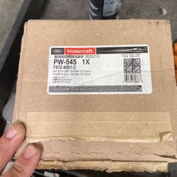 Brand New OEM Ford Water Pump With OEM Gasket. 