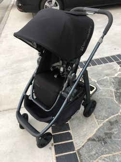 Uppababy with piggy back skate board
