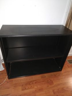 Small metal bookcase