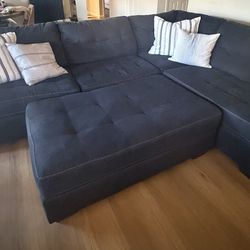 Sectional Sofa with Ottoman and pillows
