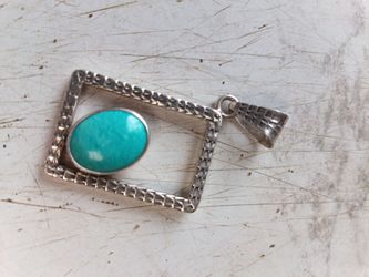 Oval-shaped turquoise stone