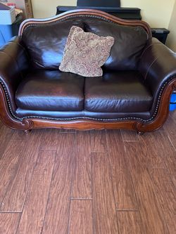 Dark Brown Leather Loveseat with Wood Frame
