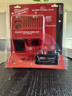MILWAUKEE M18 18 VOLT 5.0 AH BATTERY & CHARGER