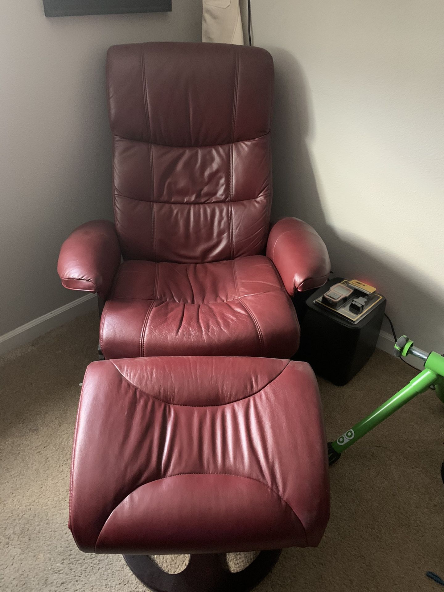Red Leather recliner and ottoman, rarely used and nice condition.
