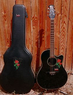 Ovation round back accoussic electric  guitar with hard shell case