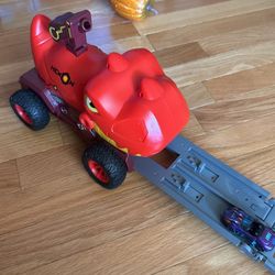 Dinosaur  Truck Toy. Used -6$ And New -12$.