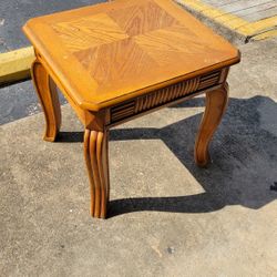 Golden honey color end table. 
20" D x 22" L x 21 1/4" H