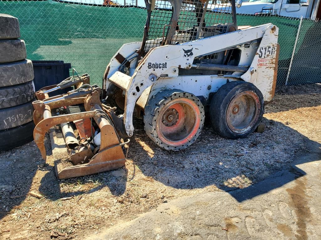 Bobcat With Grapple Bucket