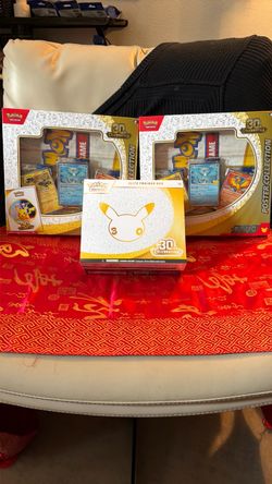 Pokémon 30th Celebration Elite Trainer Box and two 30th celebration poster box