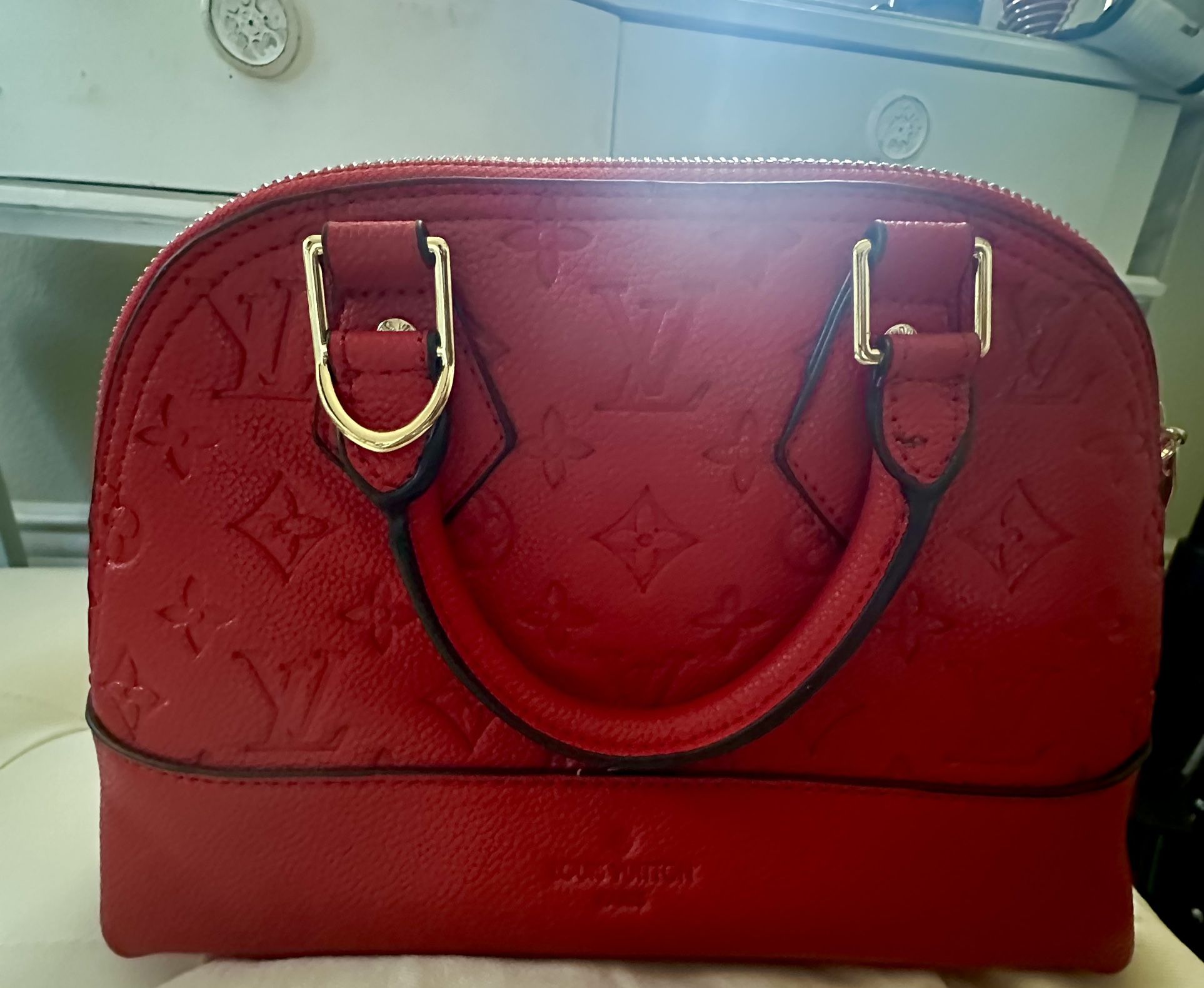 Louis Vuitton Leather Handbag (Alma)