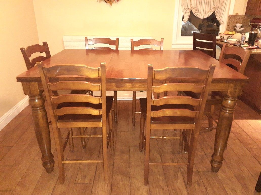 Beautiful bar height dining room table
