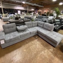 Reversible Sectional With Drop Down Cup Holders