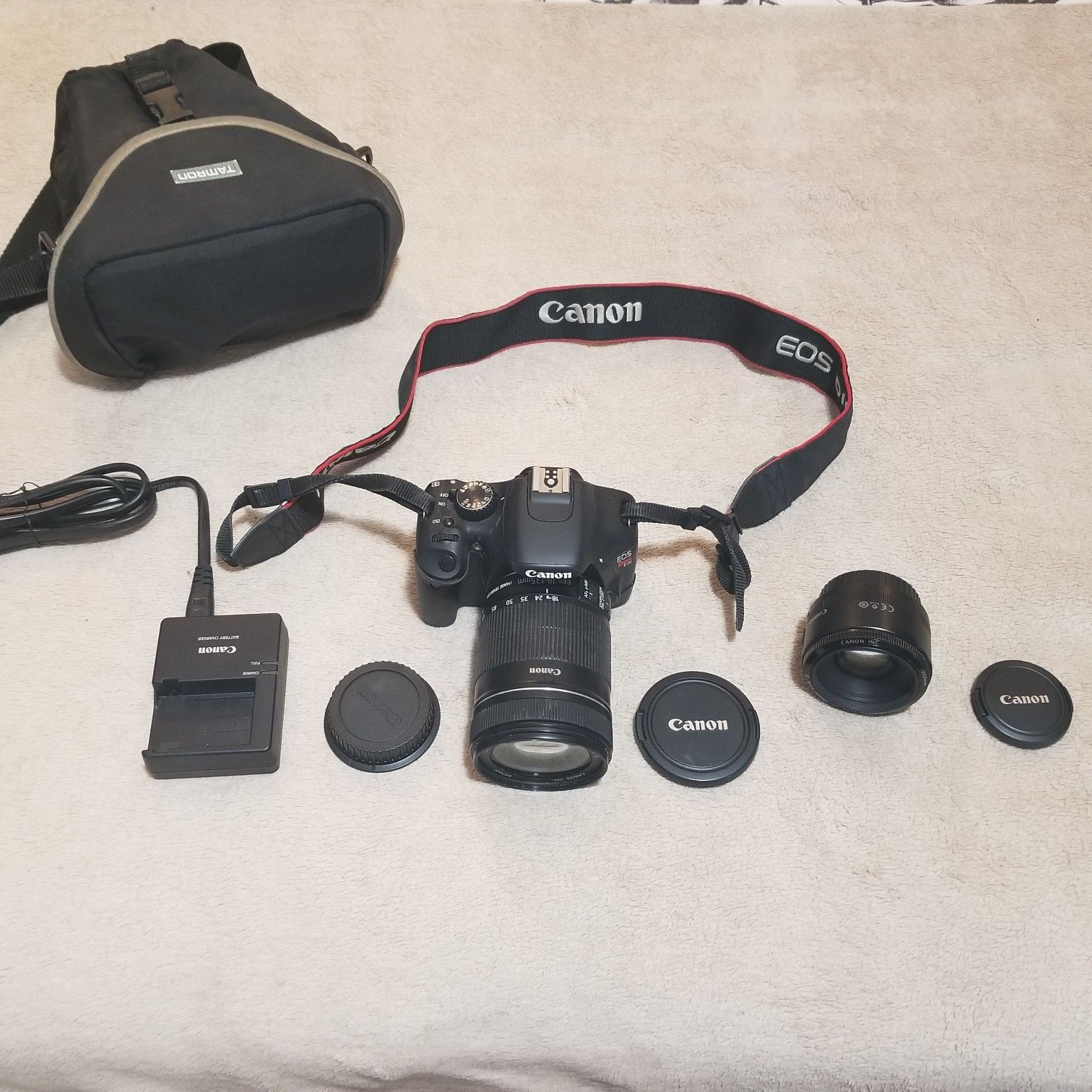 Canon EOS Rebel T2i 18MP DSLR camera with 2 lenses and extras