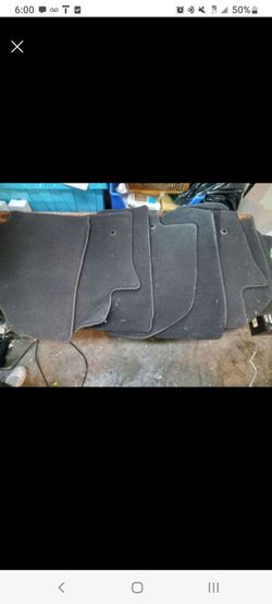 2 Full Sets Of GM Car Mats