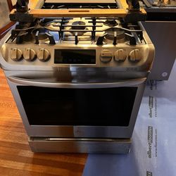 Gas Stack Washer Dryer. And Gas Cooker