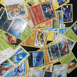 Stack Of Random Pokemon Cards 