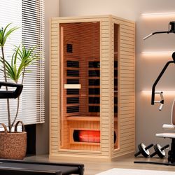 This small sauna fits easily into any area of your living space with its minimalist, modern design and attractive wooden hue. The translucent glass do