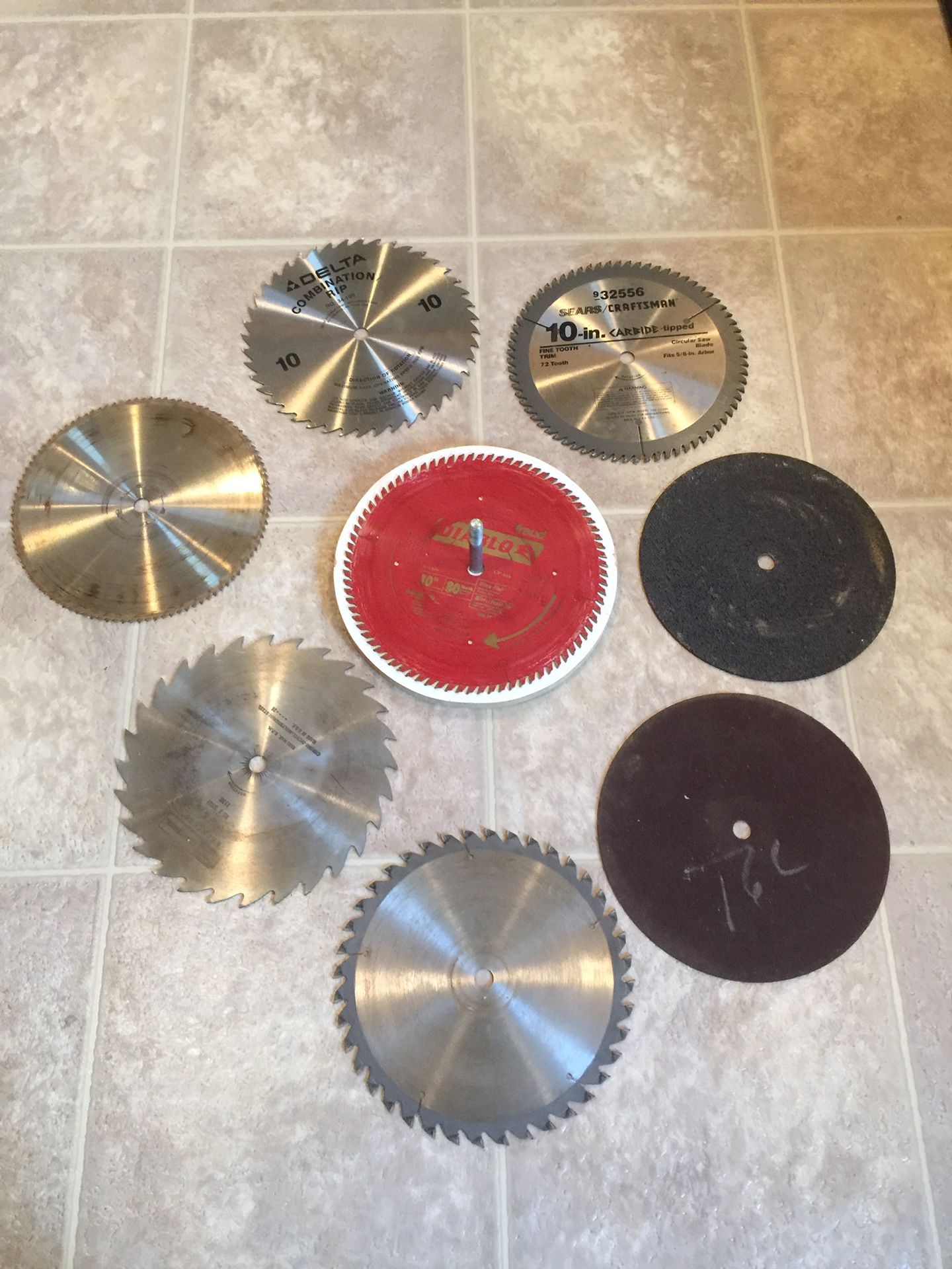 Eight (8) 10”table saw/chopsaw blades.