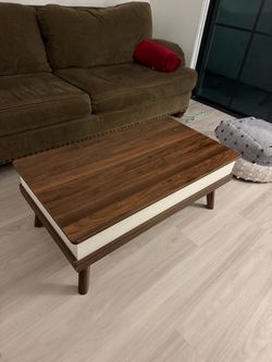 Sliding coffee table