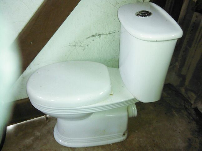 Toilet European top flush rear outlet complete with tank fittings. Costs over $300+