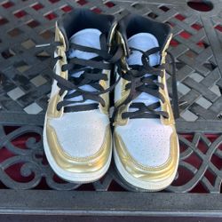 Golden Nike shoes