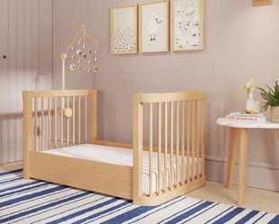 Nestig wood wave crib with washable Newton mattress