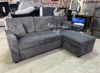 Reversible sectional sofa with pull-out bed & storage dark gray