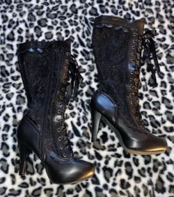 Black leather and lace high heel boots
