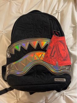 Spray ground backpack